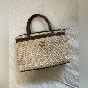 Carryland straw and faux leather purse